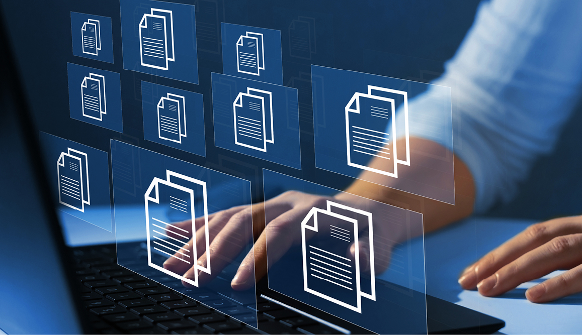 Person on laptop with several icons of files overlaying the image.