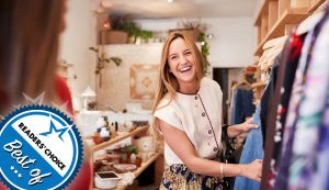 Happy customer at a small clothing boutique.